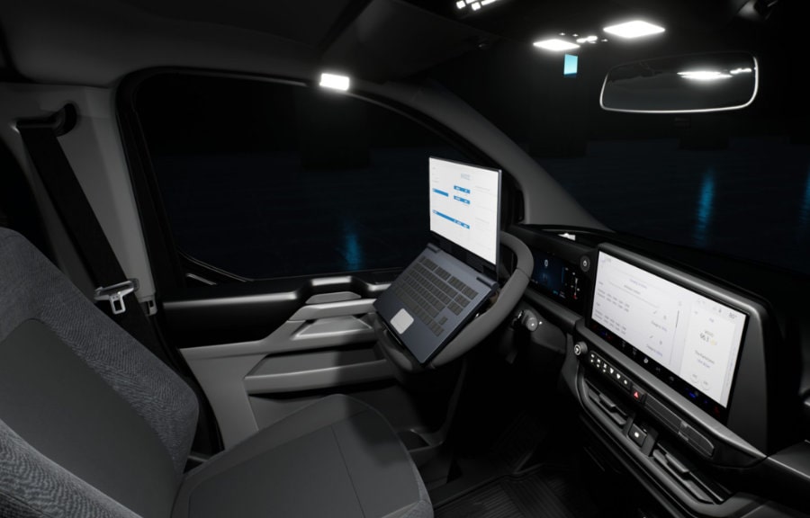 Ford E-Transit Espace intérieur personnalisé avec ordinateur portable