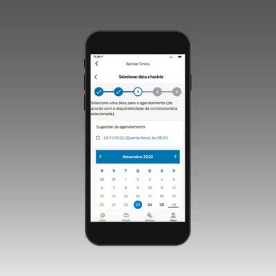 Celular exibindo o aplicativo FordPass e calendário de agendamento on-line de serviços para o veículo