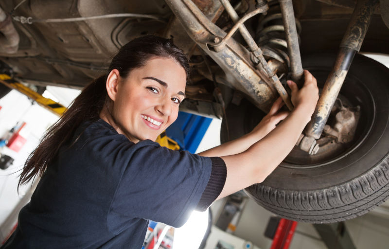 female-mechanic-working-under-car.jpg