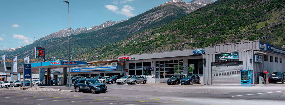 Bild der Garage St. Christophe AG und Werkstatt fotografiert an sonnigem Tag