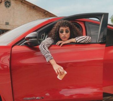 Ford Mustang Mach-E GT woman in a window