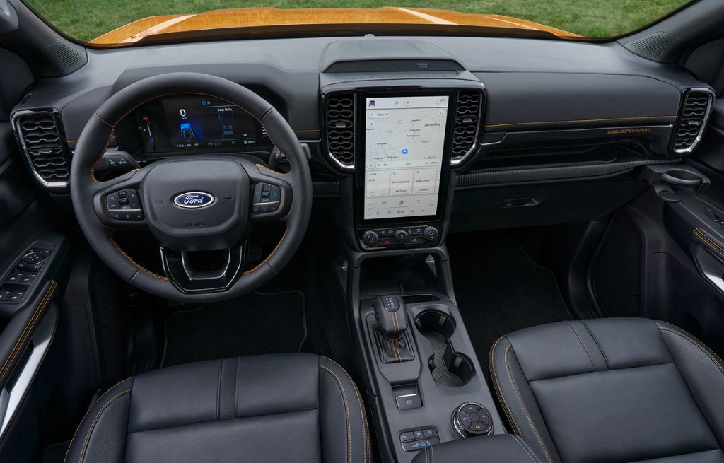 Ford Ranger Wildtrak interior showing steering wheel, touchscreen, and dashboard