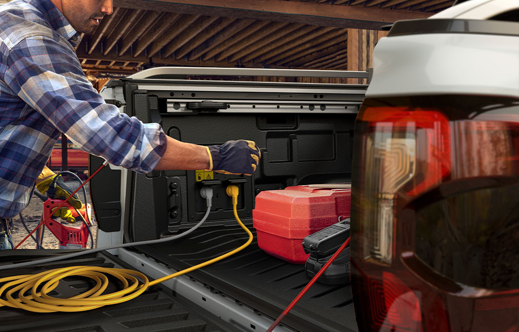 Ford Ranger Plug-in Hybrid Pro Power Onboard system powering tools from truck bed