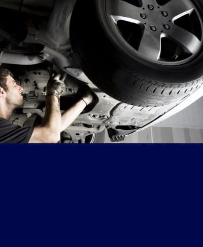 Service mechanic under car