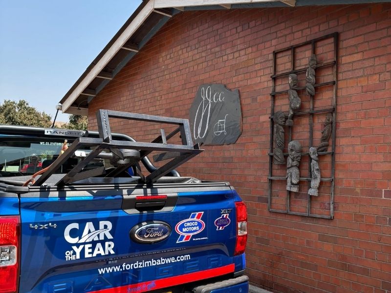 Truck bringing warmth and nourishment truck bringing stove parke in front of childrens centre